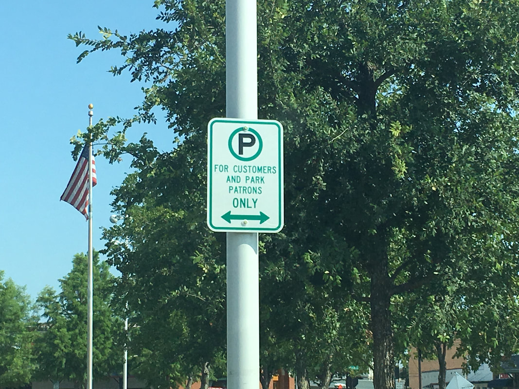 Metal Signage Parking Lot Striping Clearwater Florida
